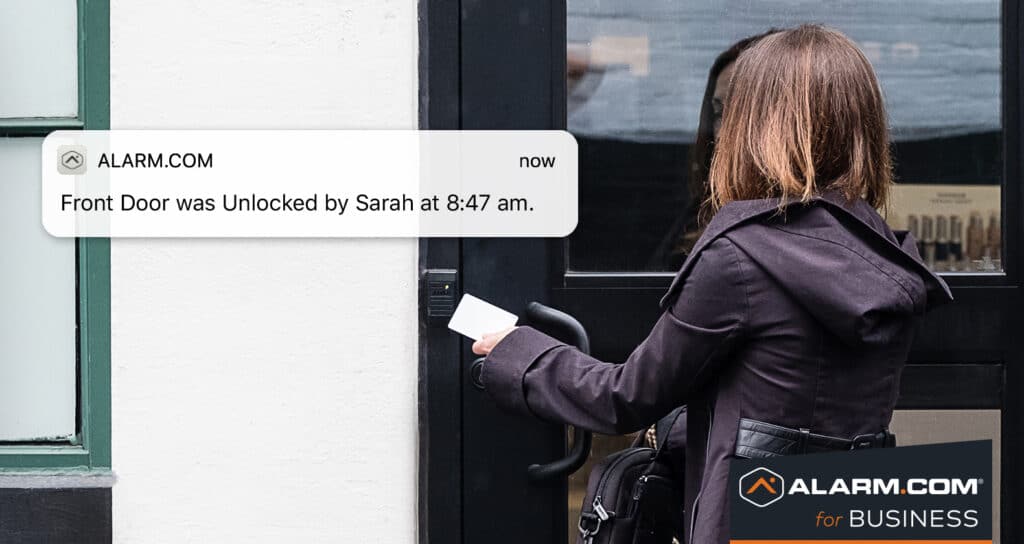 a woman uses a keyfob to enter a business, an alert reads that "Front Door was unlocked by Sarah at 8:47 am"