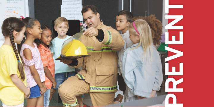 fireman teaches children about fire safety